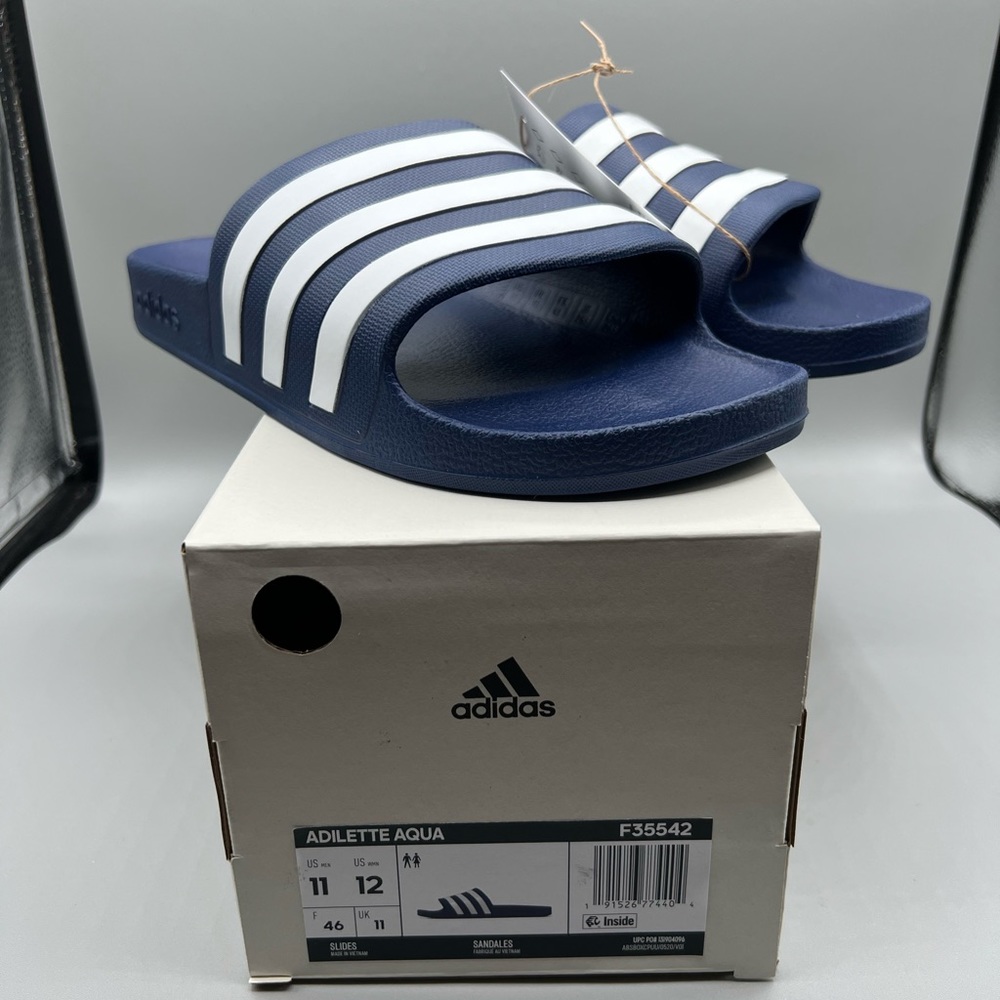 adidas Unisex Adilette‎ Aqua Slides Sandal, Dark Blue/White/Dark Blue, 11 US Men